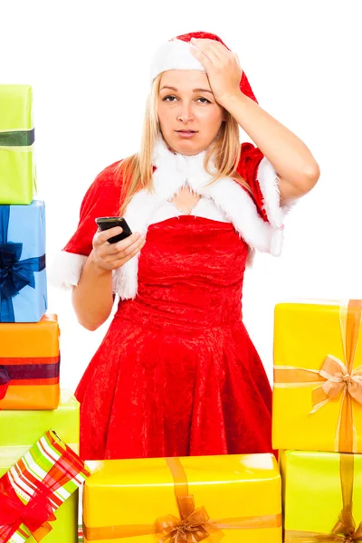 Unhappy female Christmas Santa with mobile phone — Stock Photo, Image