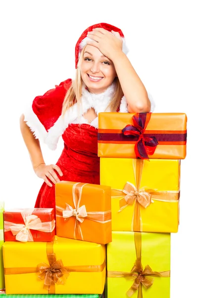 Souriant Santa femme et cadeaux de Noël — Photo