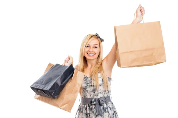 Mulher sorridente atraente com sacos de compras — Fotografia de Stock