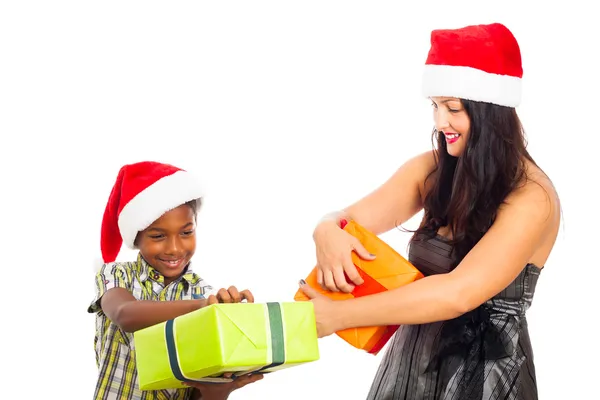 Happy woman and boy opening Christmas gifts — Stock Photo, Image