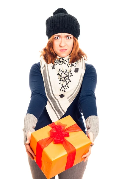 Disappointed woman with gift box — Stock Photo, Image