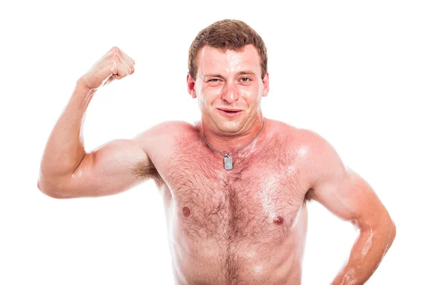 Funny sportsman showing biceps — Stock Photo, Image