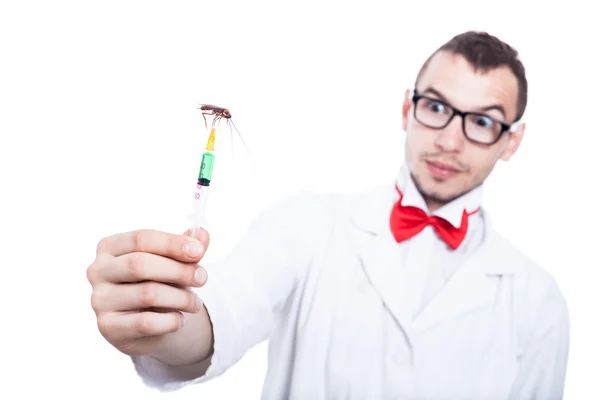 Funny scientist with syringe and cockroach — Stock Photo, Image