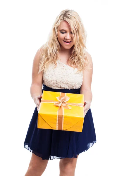 Surprised woman with gift — Stock Photo, Image
