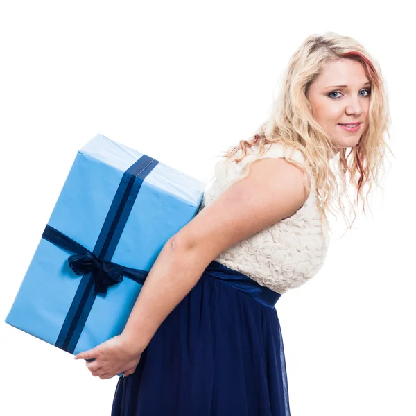 Woman carrying big gift — Stock Photo, Image