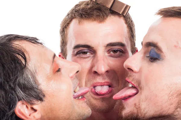 Bizarre men sticking out tongue — Stock Photo, Image