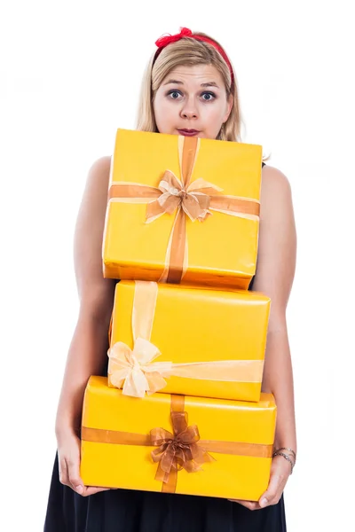 Surprised woman carrying presents — Stock Photo, Image