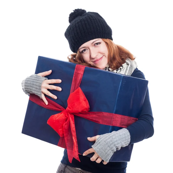 Satisfied winter woman with big present — Stock Photo, Image