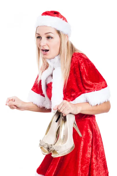 Shocked Christmas woman with shoes — Stock Photo, Image