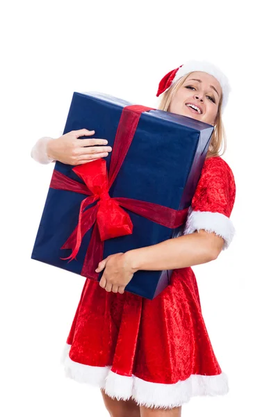 Weihnachtsfrau trägt riesiges Geschenk — Stockfoto