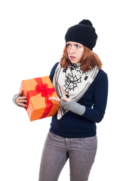 Angry woman with present — Stock Photo, Image