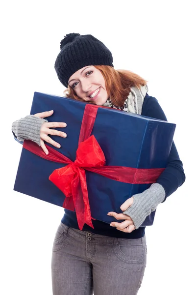 Pleased woman with big present — Stock Photo, Image