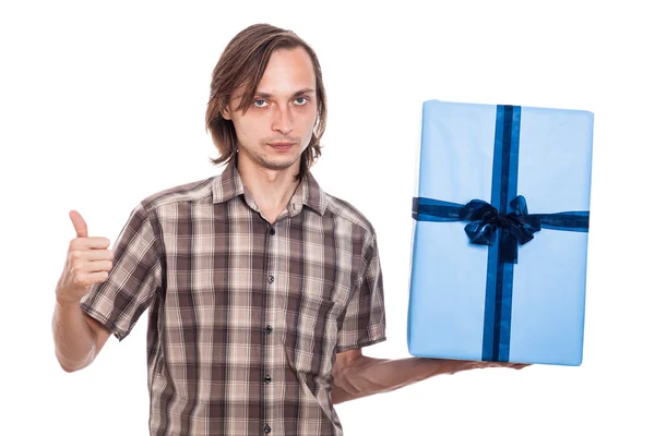 Serious man with big present Royalty Free Stock Images