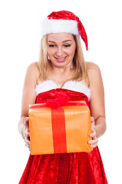 Surprised Christmas woman with present Stock Picture