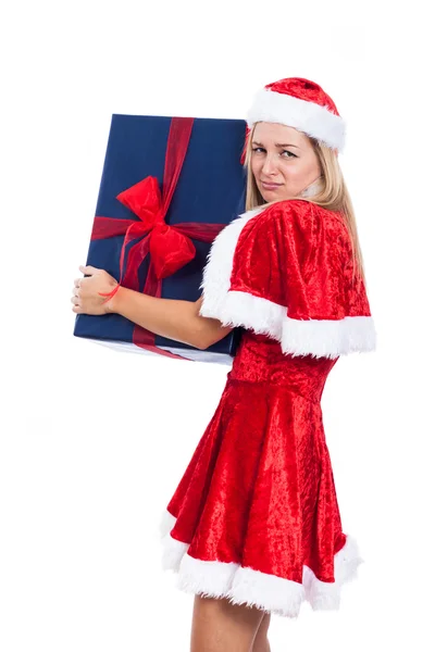 Greedy Christmas woman with big present — Stock Photo, Image