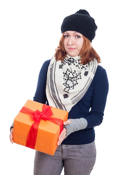 Disappointed woman with present — Stock Photo, Image