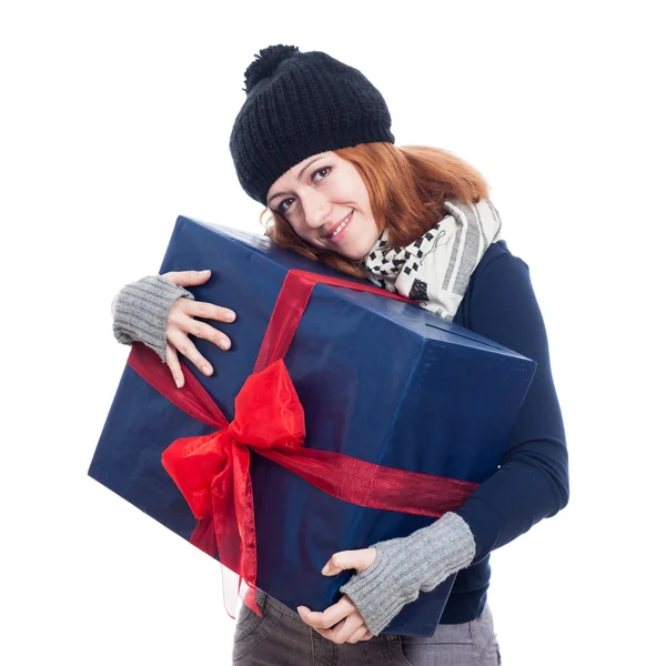Pleased woman with big present — Stock Photo, Image