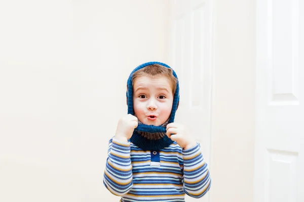 Happy child wearing winter hat — Stock Photo, Image