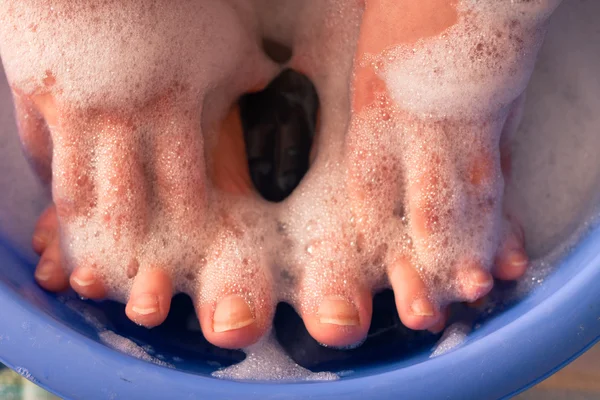 Fingers in soap bath — Stock Photo, Image