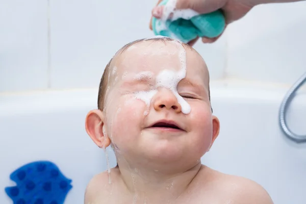 Happy baby boy bathing — Stock Photo, Image