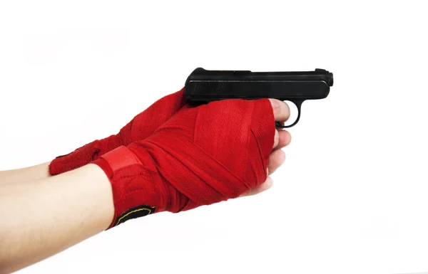 Svart pistol i en hand — Stockfoto