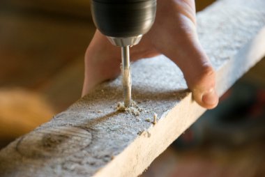 tahta bir sopa bir delik delme