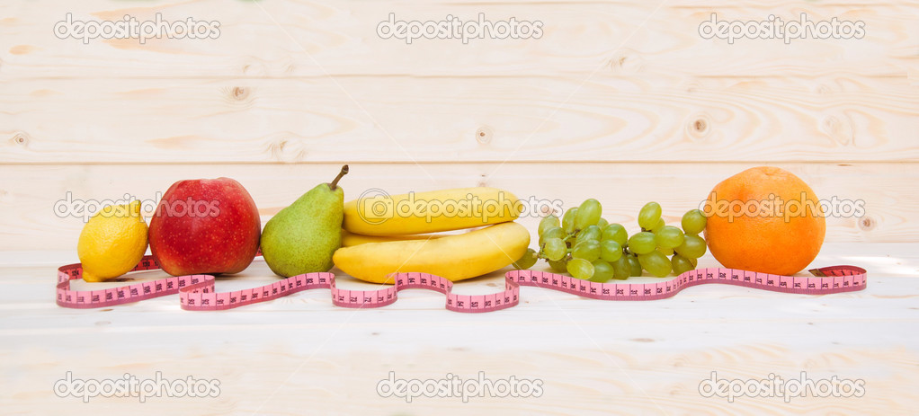 Fruits on a wooden background