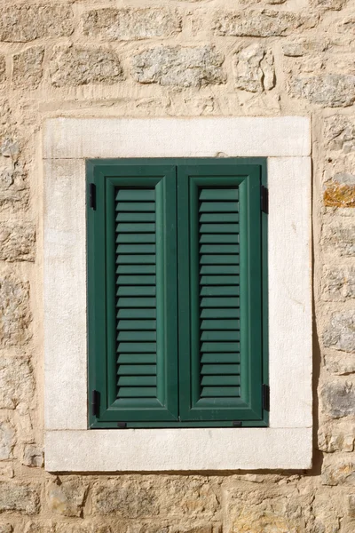 Green window on the wall — Stock Photo, Image