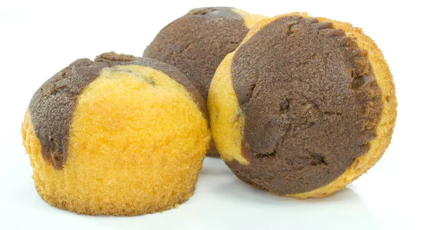 Čokoládové a vanilkové muffiny — Stock fotografie
