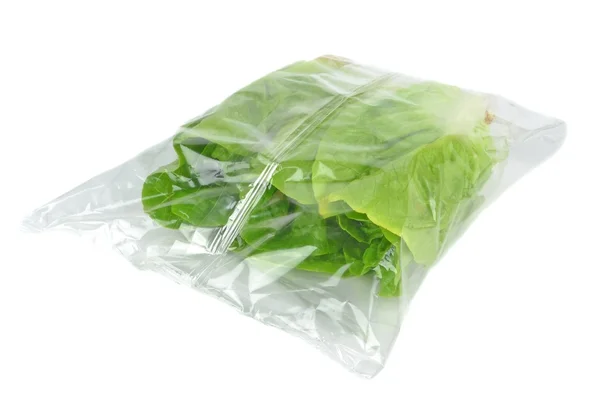 En förseglad plastpåse sallad — Stockfoto