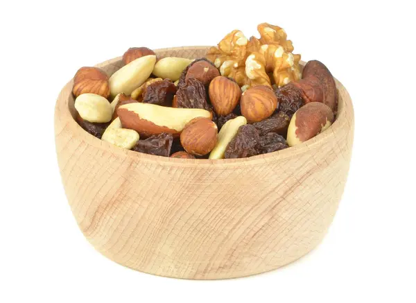 A wooden bowl of mixed fruit and nuts — Stock Photo, Image