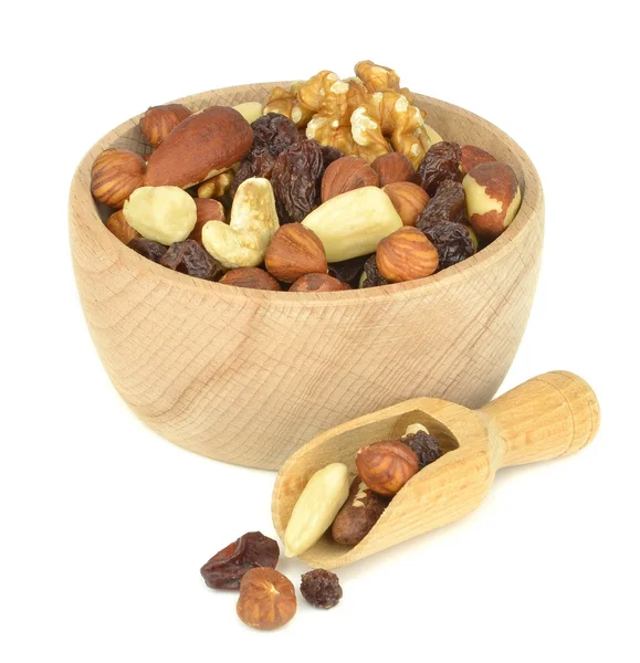 A wooden bowl of mixed fruit and nuts — Stock Photo, Image