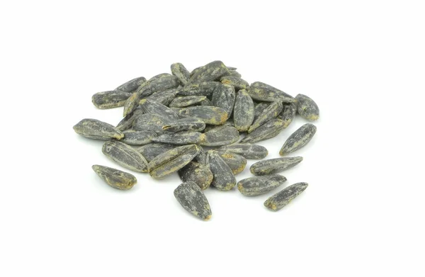 Una pila de semillas de girasol tostadas en seco —  Fotos de Stock