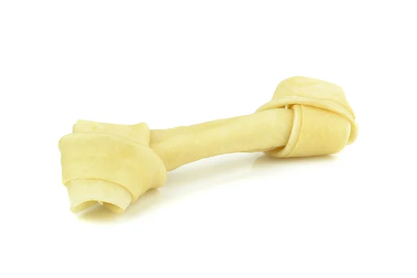 Um osso de mastigação de brinquedo de cães — Fotografia de Stock
