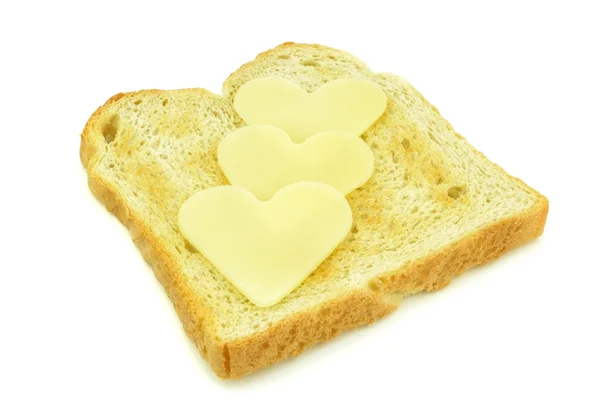 Toast met hartvormige kaas segmenten — Stockfoto