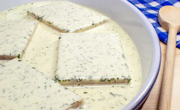 Fish blocks in Dill sauce — Stock Photo, Image