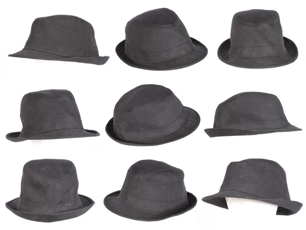 Siyah şapka üzerine beyaz izole kümesi — Stok fotoğraf