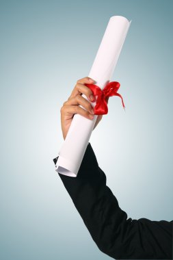 diploma met een rood lint