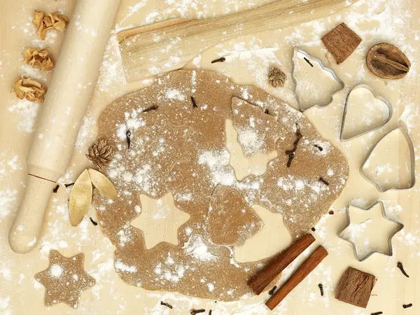 Forms of metal rolling pin flour cinnamon xmas — Stock Photo, Image