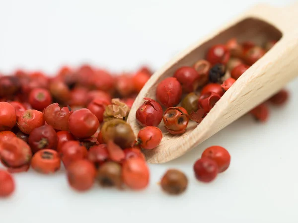 Detail of red pepper and wood object — Stock Photo, Image