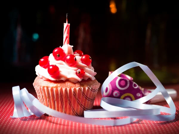 Surprise cupcake with candle — Stock Photo, Image