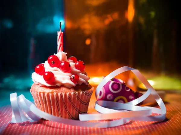 Surprise cupcake with candle — Stock Photo, Image