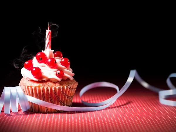 Surprise cupcake with candle — Stock Photo, Image