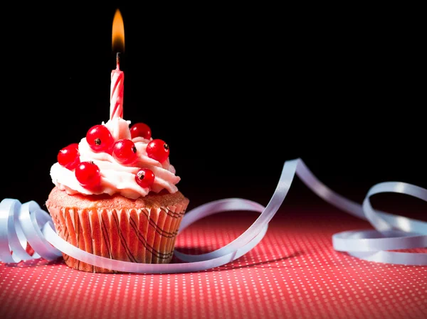 Surprise muffin with candle — Stock Photo, Image