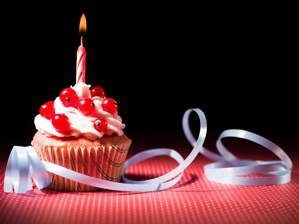 Surprise muffin with candle — Stock Photo, Image