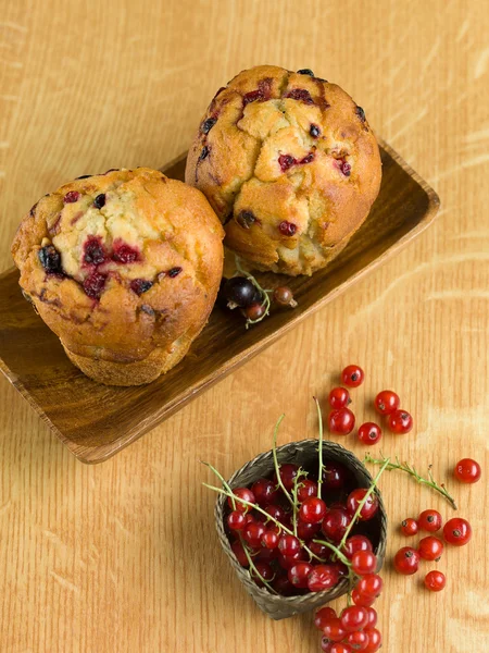 Tasty currant muffins — Stock Photo, Image