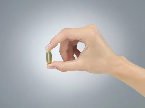 P-piller i fingrar — Stockfoto