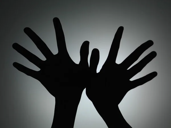 two hands silhouette