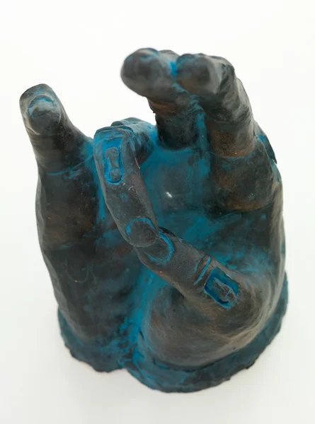 Handskulptur mit spirituellem Symbol — Stockfoto