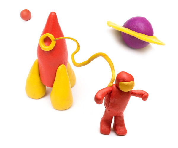 Пластиковая ракета и космонавт в космосе
.